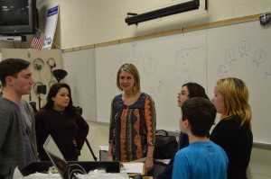 Mrs. Gerst and the HHS students explaining how the paper is run at Hammonton High.