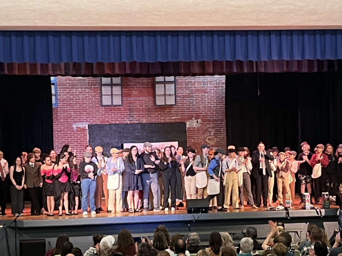 The cast and crew of Newsises Jr.